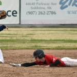 Kenai Centrals Kaiser DesOrmeaux steals a base in front of North Poles Stephen Langer at the Division II state baseball tournament at Coral Seymour Memorial Park in Kenai, Alaska, on Friday, June 6, 2025. (Photo by Jeff Helminiak/Peninsula Clarion)