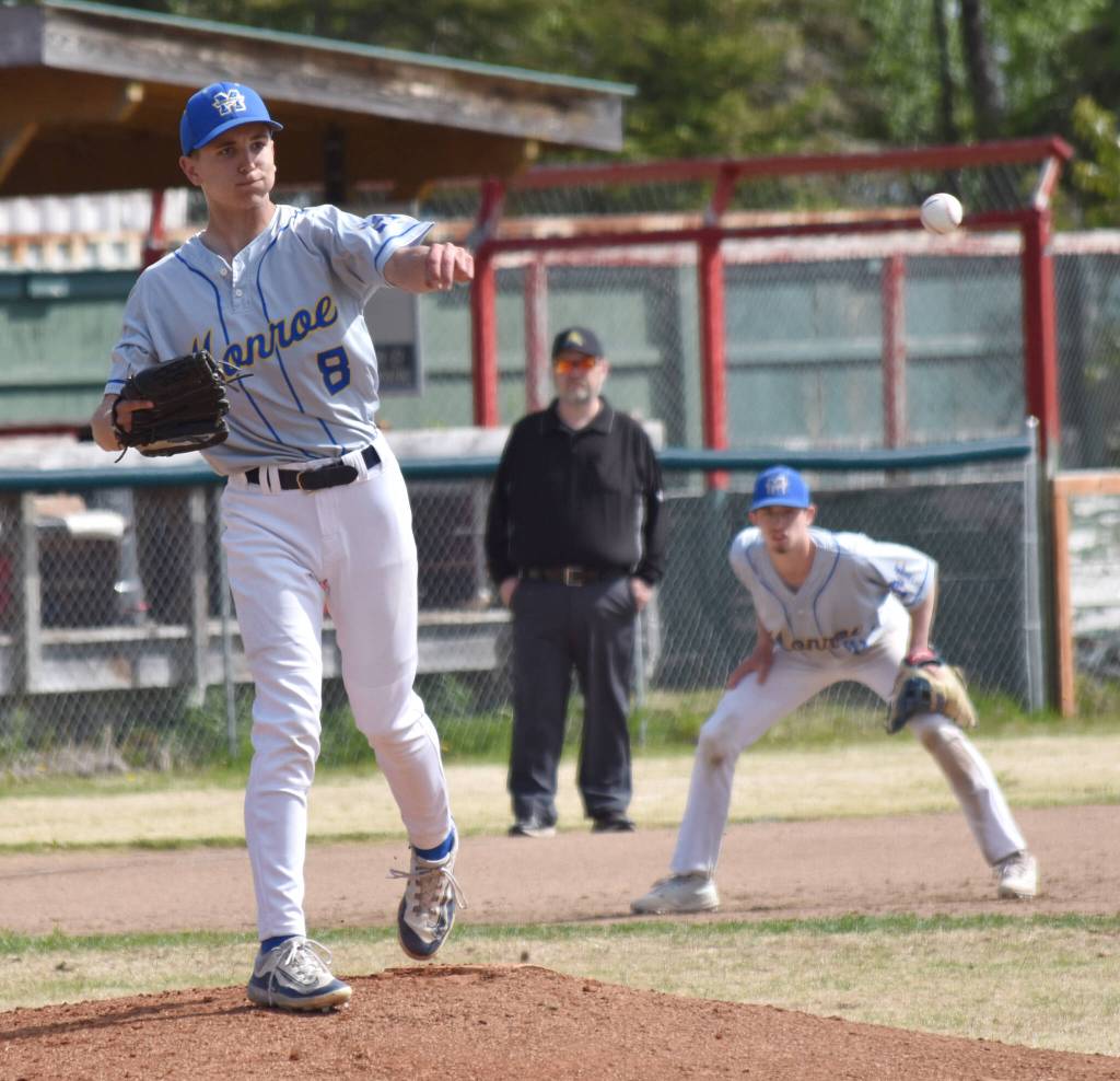 Monroe Catholics Nathan Priebe attempts a pickoff against Soldotna at the Division II state baseball tournament at Coral Seymour Memorial Park in Kenai, Alaska, on Friday, June 6, 2025. (Photo by Jeff Helminiak/Peninsula Clarion)
