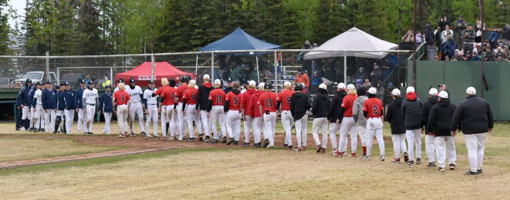 Soldotna and Kenai Central shake hands at the Division II state baseball tournament at Coral Seymour Memorial Park in Kenai, Alaska, on Saturday, June 7, 2025. (Photo by Jeff Helminiak/Peninsula Clarion)