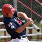 Post 20s Jayden Stuyvesant flies out to left field against West on Friday, June 13, 2025, at Coral Seymour Memorial Park in Kenai, Alaska. (Photo by Jeff Helminiak/Peninsula Clarion)