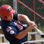 Post 20's Jayden Stuyvesant flies out to left field against West on Friday, June 13, 2025, at Coral Seymour Memorial Park in Kenai, Alaska. (Photo by Jeff Helminiak/Peninsula Clarion)