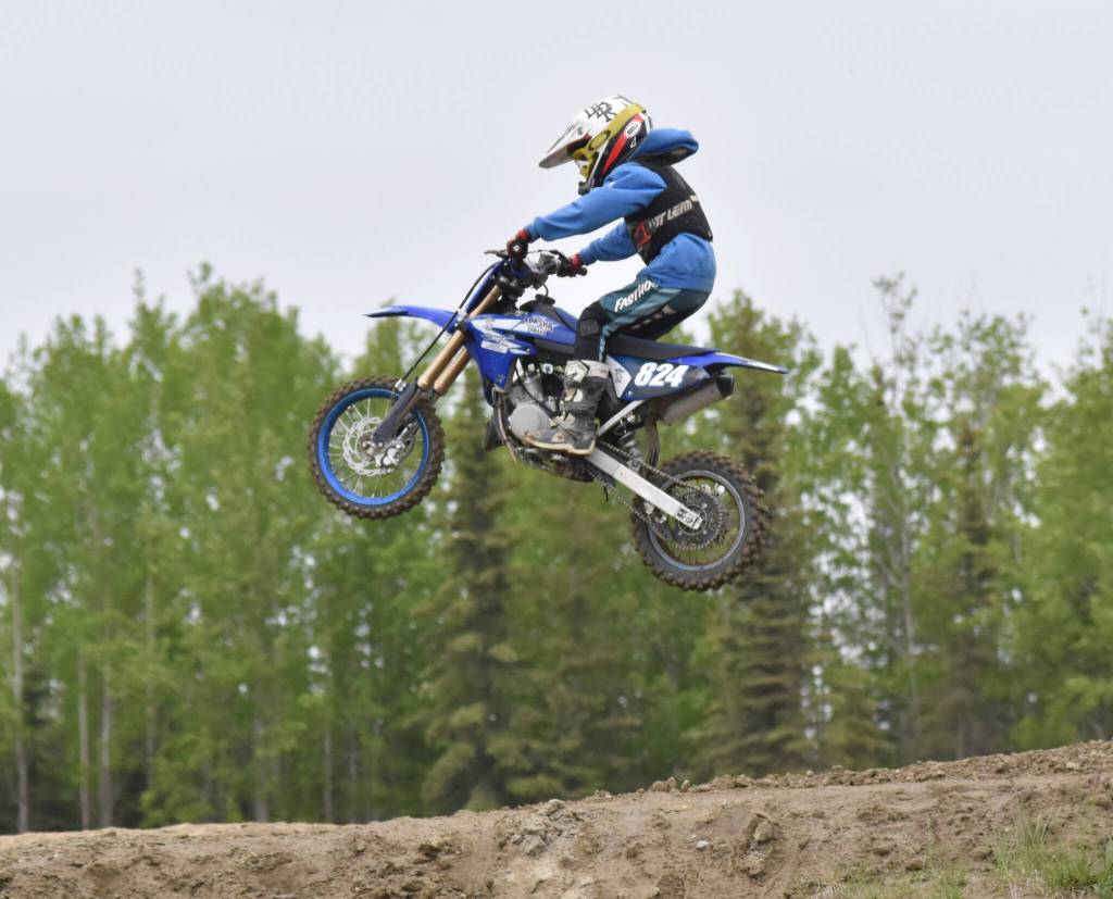 Benny Loyer of Palmer soars through the air racing 65 intermediate at the Alaska State Motocross Series Race 4 on Sunday, June 15, 2025, at Twin City Raceway in Kenai, Alaska. (Photo by Jeff Helminiak/Peninsula Clarion)