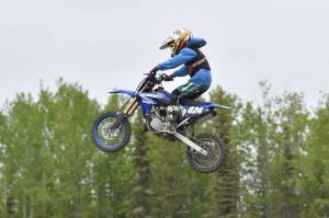 Benny Loyer of Palmer soars through the air racing 65 intermediate at the Alaska State Motocross Series Race 4 on Sunday, June 15, 2025, at Twin City Raceway in Kenai, Alaska. (Photo by Jeff Helminiak/Peninsula Clarion)