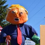 A Trump puppet by local artist Charles Aguilar floats above the crowd during the No Kings protest at WKFL Park on Saturday, June 14, 2025, in Homer, Alaska. (Chloe Pleznac/Homer News)