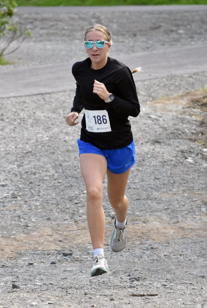 Katie DeBardelaben in the womens 5-kilometer race at the Run for the River on Saturday, June 14, 2025, in Soldotna, Alaska. (Photo by Jeff Helminiak/Peninsula Clarion)