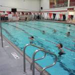 Jake Dye/Peninsula Clarion
Pool manager and swim coach Will Hubler leads a treading water exercise at Kenai Central High School on Tuesday.