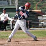 Clyde Clemens of the Post 20 Twins swings through a hit pitch Friday, June 20, 2025, in the Lance Coz Wood Bat Tournament at Coral Seymour Memorial Park in Kenai, Alaska. (Photo by Jeff Helminiak/Peninsula Clarion)