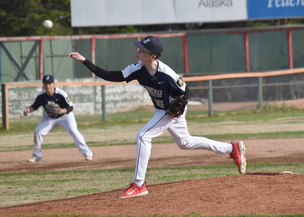 Cayman Huff of Auke Bay Post 25 delivers an offspeed pitch to Madisonville (Kentucky) Post 6 on Friday, June 20, 2025, in the Lance Coz Wood Bat Tournament at Coral Seymour Memorial Park in Kenai, Alaska. (Photo by Jeff Helminiak/Peninsula Clarion)