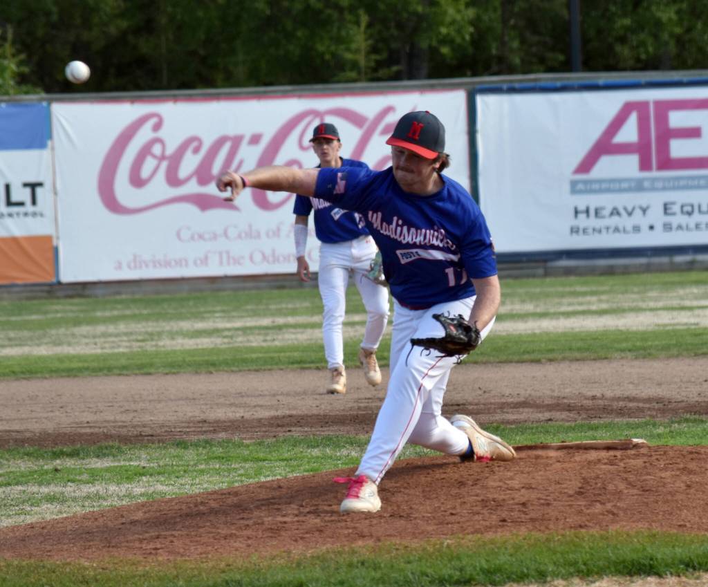 Jayce Weaver of Madisonville (Kentucky) Post 6 delivers to Auke Bay Post 25 on Friday, June 20, 2025, in the Lance Coz Wood Bat Tournament at Coral Seymour Memorial Park in Kenai, Alaska. (Photo by Jeff Helminiak/Peninsula Clarion)