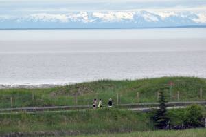 Runners take a Kenai beach access road during the Kenai Summer Solstice Fun Run in Kenai, Alaska, on Saturday, June 21, 2025. (Photo by Jeff Helminiak/Peninsula Clarion)
