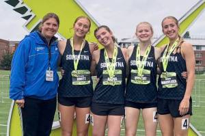 Assistant coach Krista Arthur plus the 3,200-meter relay of Sasha Brott, Annie Burns, Sophia Jedlicki and Katie DeBardelaben at Nike Outdoor Nationals at Hayward Field in Eugene, Oregon, from June 19 to 22, 2025. (Photo provided)