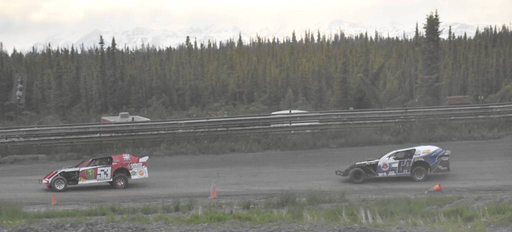 Clay Petersen leads Dustin Bass on the way to victory in the Modifieds feature Saturday, June 21, 2025, at the Mini Stock Dirty 30 at Twin City Raceway in Kenai, Alaska. (Photo by Jeff Helminiak/Peninsula Clarion)