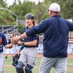 Malakai BeDunnah and Ari Miller of the American Legion Post 20 Twins are congratulated by head coach Robb Quelland on Saturday, June 28, 2025, at the Alaska 529 Midseason Classic at Mulcahy Stadium in Anchorage, Alaska. (Photo by Stephanie Burgoon/Alaska Sports Report)