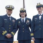 Commanding Officer Corey Engel, Rear Adm. Megan Dean, and former ASPEN Commanding Officer Shea Winterberger smile for a photograph during the Change of Command ceremony on Thursday, June 26, 2025, on the Homer Spit in Homer, Alaska. (Chloe Pleznac/Homer News)