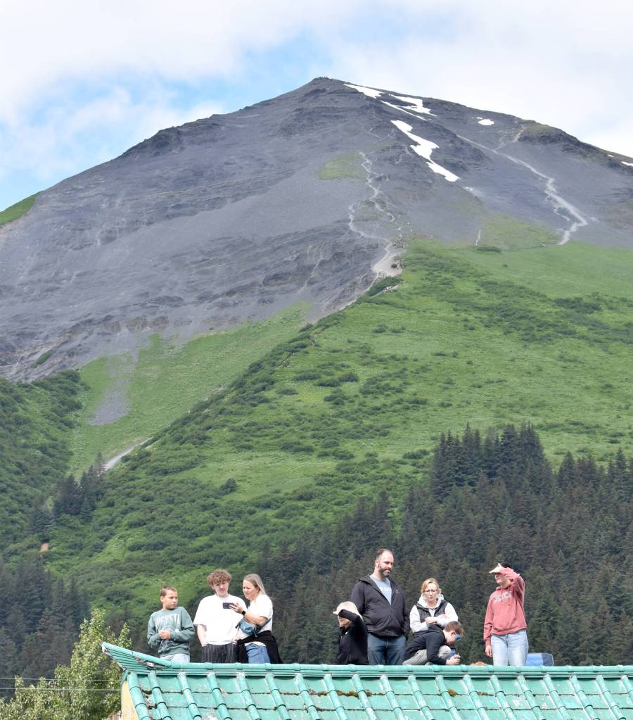 Spectators enjoy the womens race at the Mount Marathon Race on July 4, 2025, in Seward, Alaska. (Photo by Jeff Helminiak/Peninsula Clarion)