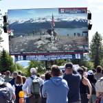 Spectators watch as David Norris, 34, of Steamboat Springs, Colorado, round race point at the Mount Marathon Race on July 4, 2025, in Seward, Alaska. (Photo by Jeff Helminiak/Peninsula Clarion)