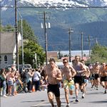 Max King, 45, of Bend, Oregon, works to reel in an early breakaway racer during the mens race at the Mount Marathon Race on July 4, 2025, in Seward, Alaska. (Photo by Jeff Helminiak/Peninsula Clarion)