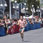 Lars Arneson, 35, of Anchorage finishes the mens race at the Mount Marathon Race on July 4, 2025, in Seward, Alaska. (Photo by Jeff Helminiak/Peninsula Clarion)
