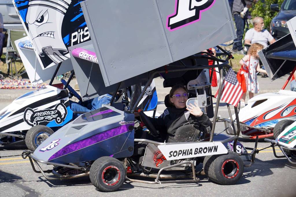 Sophia Brown rolls with the Kenai Peninsula Racing Lions during a Fourth of July parade on South Willow Street in Kenai, Alaska, on July 4, 2025. (Photo courtesy Sarah Every)