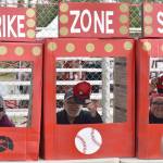 Sharon Tyone, Dan Aaronson and Jessica Small make the "real life slot machine" work at the Oilers All-Star Family Field Day on Saturday, July 5, 2025, at Coral Seymour Memorial Park in Kenai, Alaska. (Photo by Jeff Helminiak/Peninsula Clarion)
