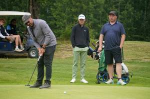 Zac Cowan putts a golf ball into a hole during the Alaska Sign Source Pro Am at Birch Ridge Golf Course in Soldotna, Alaska, on Monday, July 14, 2025. (Jake Dye/Peninsula Clarion)