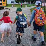Children are photographed outside their now shuttered school, Pearl Creek Elementary, in August 2024 in Fairbanks, Alaska. (Photo provided by Morgan Dulian)