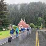Evacuees in Seward, Alaska, walk along Adams Street following a tsunami warning on Wednesday, July 16, 2025. (Photo by Jeff Helminiak/Peninsula Clarion)