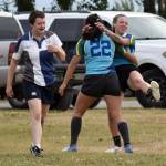Bri Gentry celebrates scoring a try with Bambi Zhung (22) while Jules Carroll looks on at the Kenai Dipnet Fest Rugby 10s Tournament at Kenais Millennium Square on Saturday, July 19, 2025. (Photo by Jeff Helminiak/Peninsula Clarion)