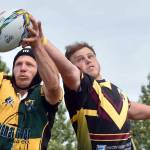 Mike Lundgren of Homer, playing for the Kenai River Wolfpack, snatches the ball from Austin Hinton of the Bird Creek Barbarians at the Kenai Dipnet Fest Rugby 10s Tournament at Kenai's Millennium Square on Saturday, July 19, 2025. (Photo by Jeff Helminiak/Peninsula Clarion)