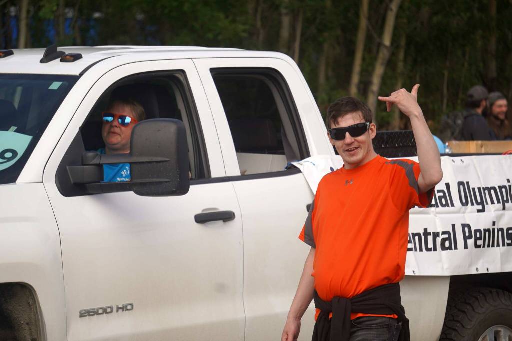 Jason Criss, a Soldotna athlete who is set to compete in Minnesota next year for the 2026 Special Olympics USA Games, walks with Central Peninsula Special Olympics during the 68th Annual Soldotna Progress Days Parade in Soldotna, Alaska, on Saturday, July 26, 2025. (Jake Dye/Peninsula Clarion)