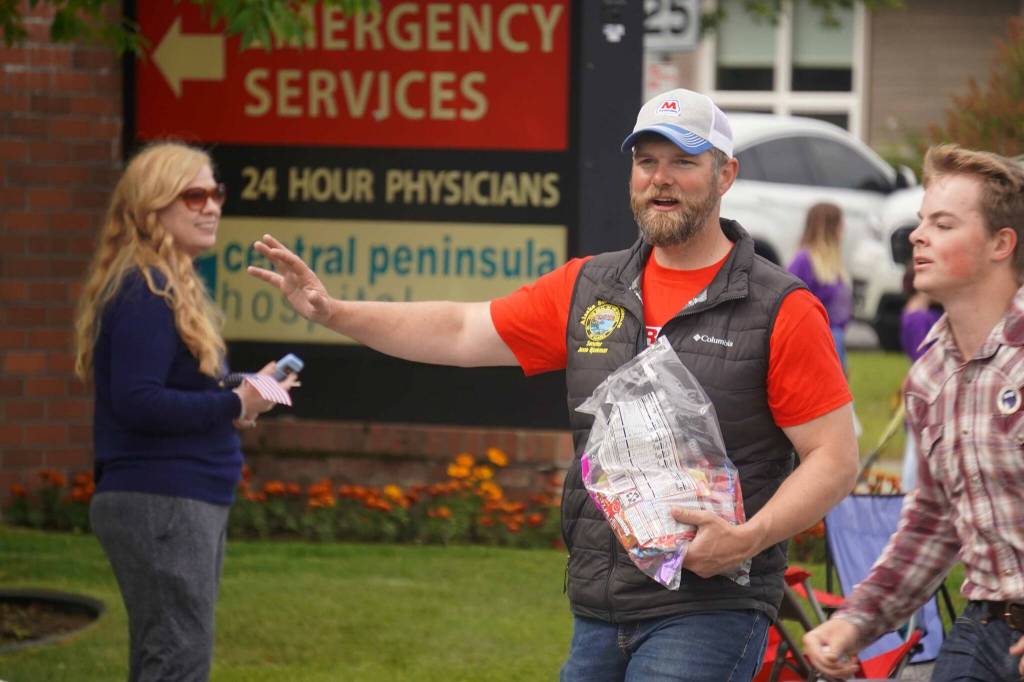 Sen. Jesse Bjorkman, R-Nikiski, throws candy during the 68th Annual Soldotna Progress Days Parade in Soldotna, Alaska, on Saturday, July 26, 2025. (Jake Dye/Peninsula Clarion)