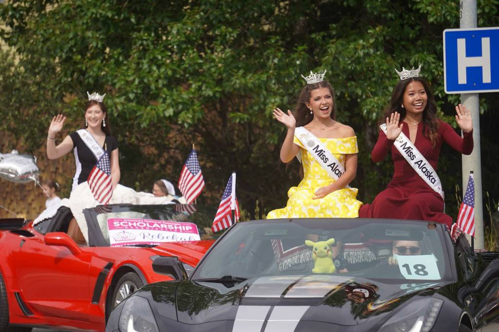 Two Miss Alaska winners and Miss Louisiana wave at children during the 68th Annual Soldotna Progress Days Parade in Soldotna, Alaska, on Saturday, July 26, 2025. (Jake Dye/Peninsula Clarion)