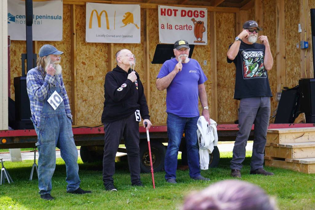 Contestants in the moustache contest show off their entries at the Progress Days Block Party at Parker Park in Soldotna, Alaska, on Saturday, July 26, 2025. (Jake Dye/Peninsula Clarion)