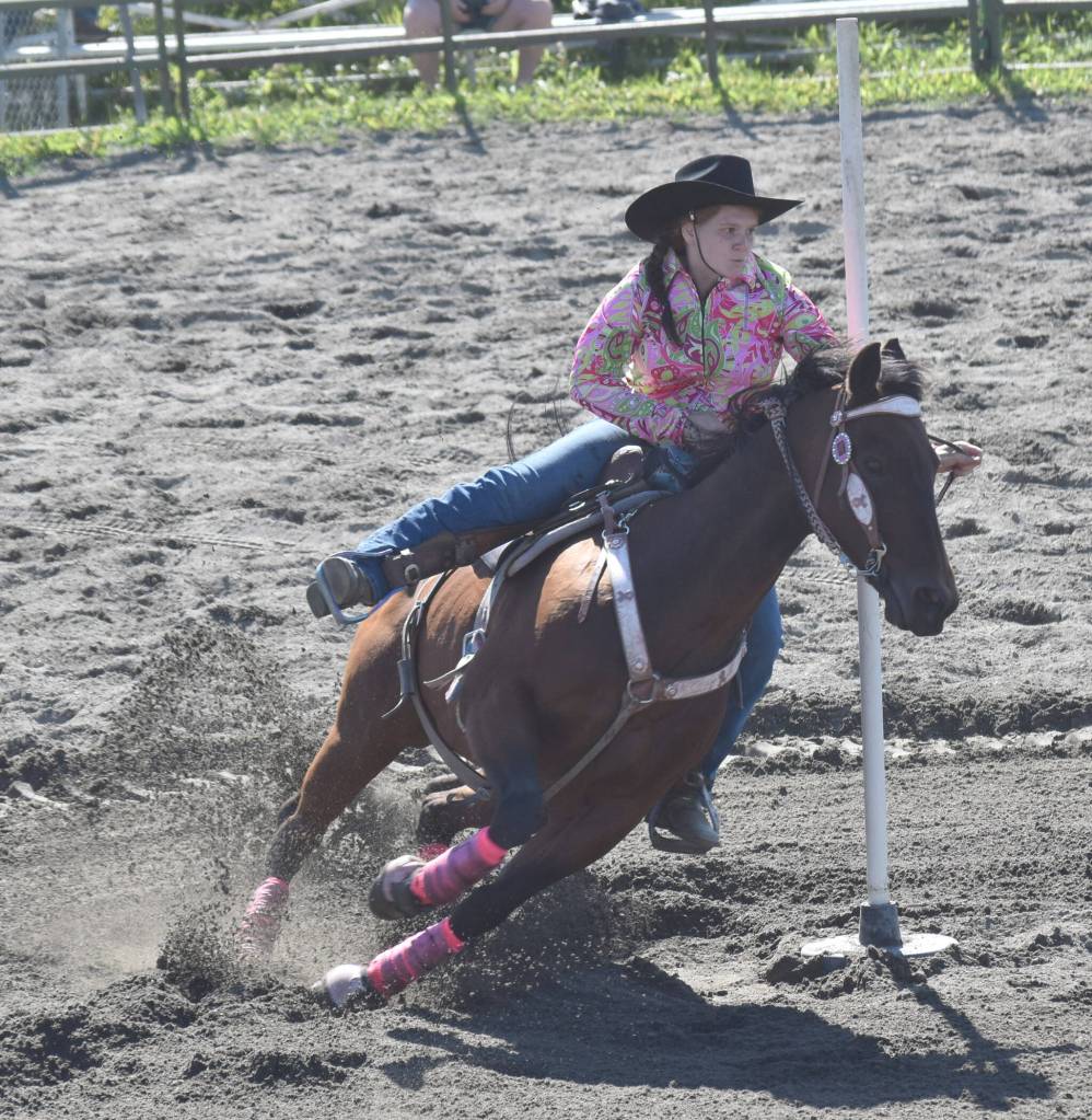 Teresa Bitterich competes in Open Poles at the third Soldotna Equestrian Association rodeo of the year Sunday, July 27, 2025, at the Soldotna Rodeo Grounds in Soldotna, Alaska. (Photo by Jeff Helminiak/Peninsula Clarion)