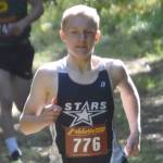 Soldotna's Ollie Dahl leads Seward's Ridge Conant at the start of the freshmen-sophomore boys race Monday, Aug. 19, 2024, at the Peninsula Class Races at Nikiski Middle-High School in Nikiski, Alaska. (Photo by Jeff Helminiak/Peninsula Clarion)