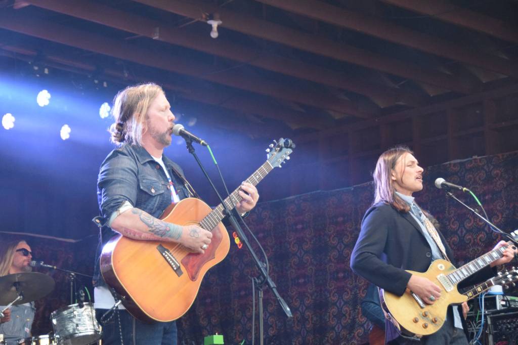 Devon Allman and Duane Betts, of the Allman Betts Band, sing on the River Stage during Salmonfest on Sunday, Aug. 3, 2025, at the Kenai Peninsula Fairgrounds in Ninilchik, Alaska. (Delcenia Cosman/Homer News)