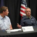 Jakob Kooly, vice chair of the Kenaitze Indian Tribes tribal council, and Robert F. Kennedy Jr., U.S. secretary of health and human services, speak during a press conference at the Denaina Wellness Center in Kenai, Alaska, on Thursday, Aug. 7, 2025. (Jake Dye/Peninsula Clarion)