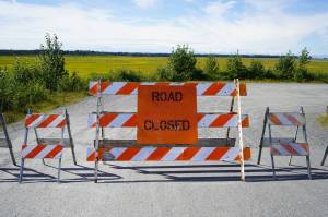 A road closed sign stands at the Kenai River flats turnoff in Kenai, Alaska, on Monday, Aug. 4, 2025. (Jonas Oyoumick/Peninsula Clarion)