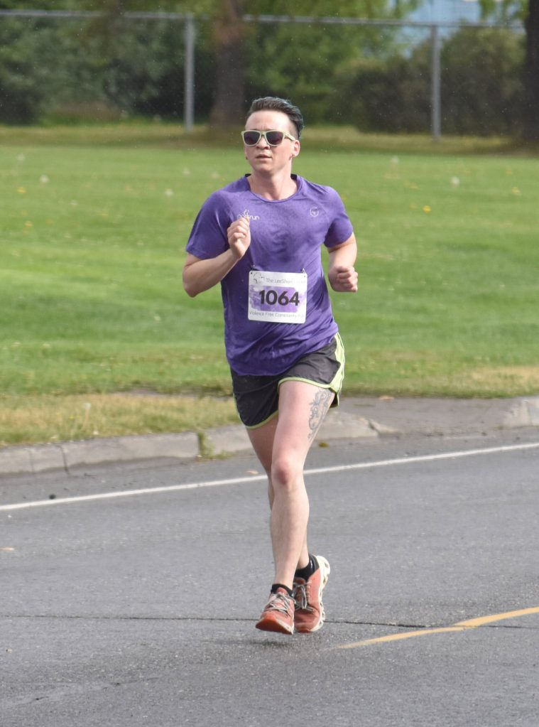 Soldotnas Niko Zlotnik runs to victory in the mens 10-kilometer race at the 36th annual Violence Free Community Run on Saturday, Aug. 9, 2025, in Kenai, Alaska. (Photo by Jeff Helminiak/Peninsula Clarion)