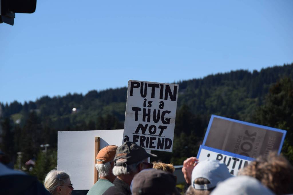 A sign held by a protester at the intersection of Lake Street and the Sterling Highway in Homer, Alaska, following President Donald Trumps meeting in Anchorage with Russian President Vladimir Putin on Friday, Aug. 15, 2025, reads Putin is a thug not a friend. (Delcenia Cosman/Homer News)