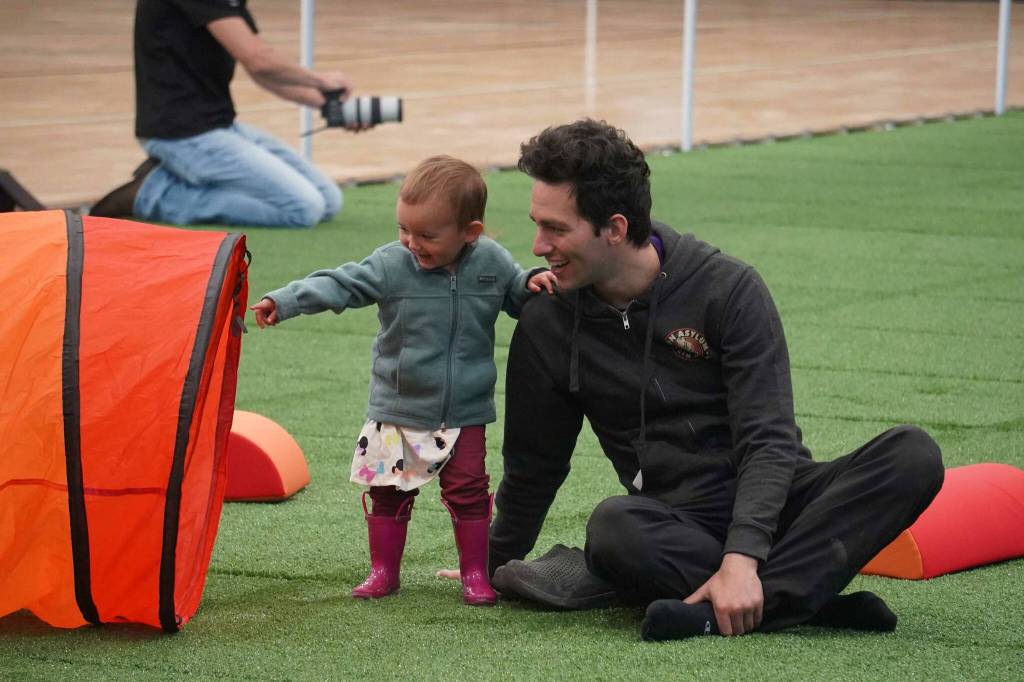 Children and families tour the Soldotna Field House during its grand opening in Soldotna, Alaska, on Saturday, Aug. 16, 2025. (Jake Dye/Peninsula Clarion)