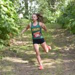 Sewards Olive Jordan runs to victory in the freshmen-sophomore girls race at the Kenai/Nikiski Class Races on Monday, Aug. 18, 2025, at Nikiski Middle-High School in Nikiski, Alaska. (Photo by Jeff Helminiak/Peninsula Clarion)