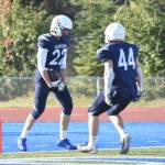 Soldotnas Matthew Schilling celebrates his touchdown with Logan Myers on Friday, Aug. 22, 2025, at Justin Maile Field at Soldotna High School in Soldotna, Alaska. (Photo by Jeff Helminiak/Peninsula Clarion)