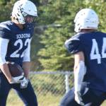 Soldotna's Matthew Schilling celebrates his touchdown with Logan Myers on Friday, Aug. 22, 2025, at Justin Maile Field at Soldotna High School in Soldotna, Alaska. (Photo by Jeff Helminiak/Peninsula Clarion)