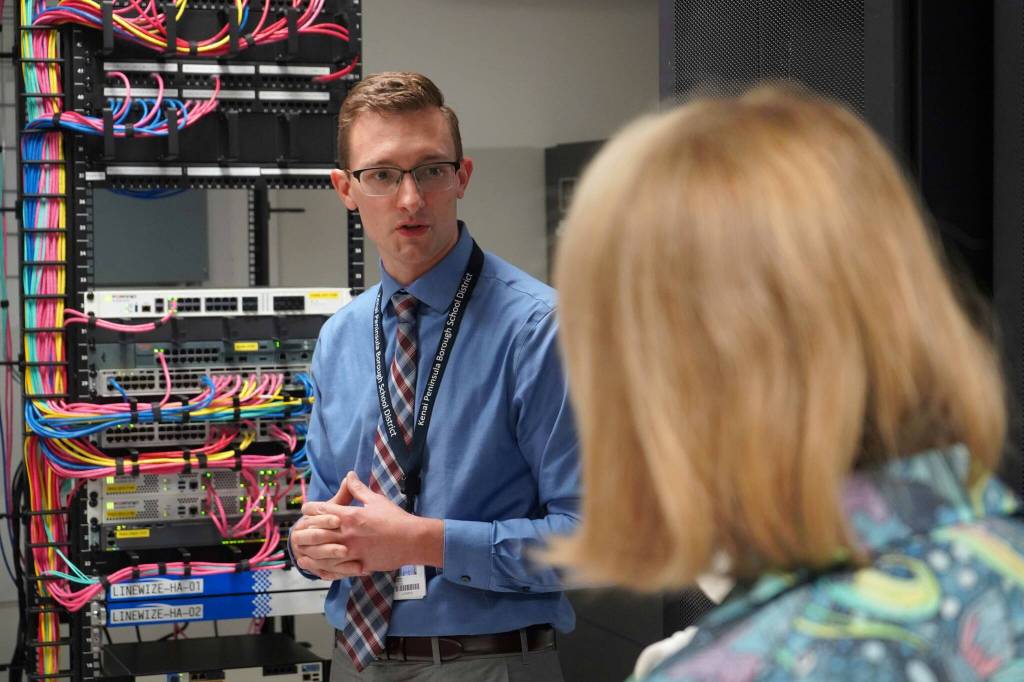 Kenai Peninsula Borough School District IT Manager Jordan Chilson leads a tour of the districts server infrastructure in Soldotna, Alaska, on Wednesday, Aug. 20, 2025. (Jake Dye/Peninsula Clarion)