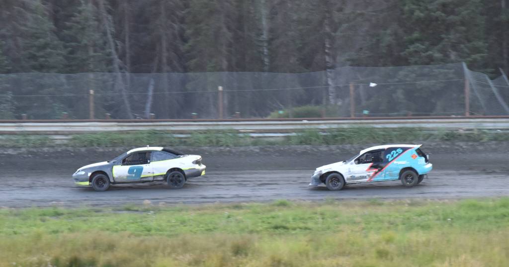 Jared Hutchings (9) finished first and Kyla Stockman (22) finished second in the Mini Stock feature at the 2025 Willie Creech Legend Memorial Race at Twin City Raceway in Kenai, Alaska, on Saturday, Aug. 23, 2025. (Photo by Jeff Helminiak/Peninsula Clarion)