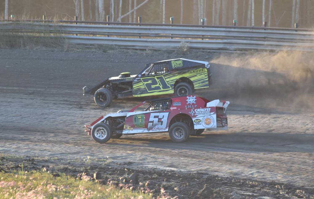 Clay Petersen (53) battles to lap Michael Sauve on the way to victory in the Modifieds feature at the 2025 Willie Creech Legend Memorial Race at Twin City Raceway in Kenai, Alaska, on Saturday, Aug. 23, 2025.