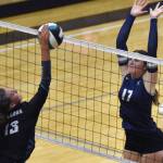 Soldotnas Rebekah Pieh puts up a block on Nikiskis Mandee Roofe on Tuesday, Aug. 26, 2025, at Nikiski Middle-High School in Nikiski, Alaska. (Photo by Jeff Helminiak/Peninsula Clarion)