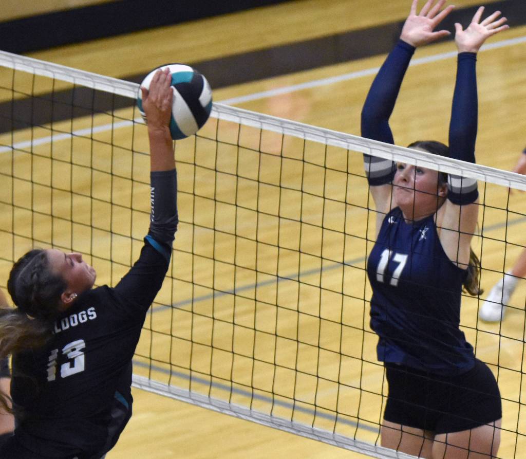 Soldotnas Rebekah Pieh puts up a block on Nikiskis Mandee Roofe on Tuesday, Aug. 26, 2025, at Nikiski Middle-High School in Nikiski, Alaska. (Photo by Jeff Helminiak/Peninsula Clarion)