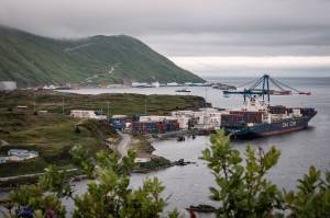 Haiyun Jiang / The New York Times
A container ship docks at Dutch Harbor in Unalaska, Aug. 13. Threatened by the president with political retribution, Republicans agreed to defund public broadcasting, imperiling a lifeline of communication in rural Alaska.